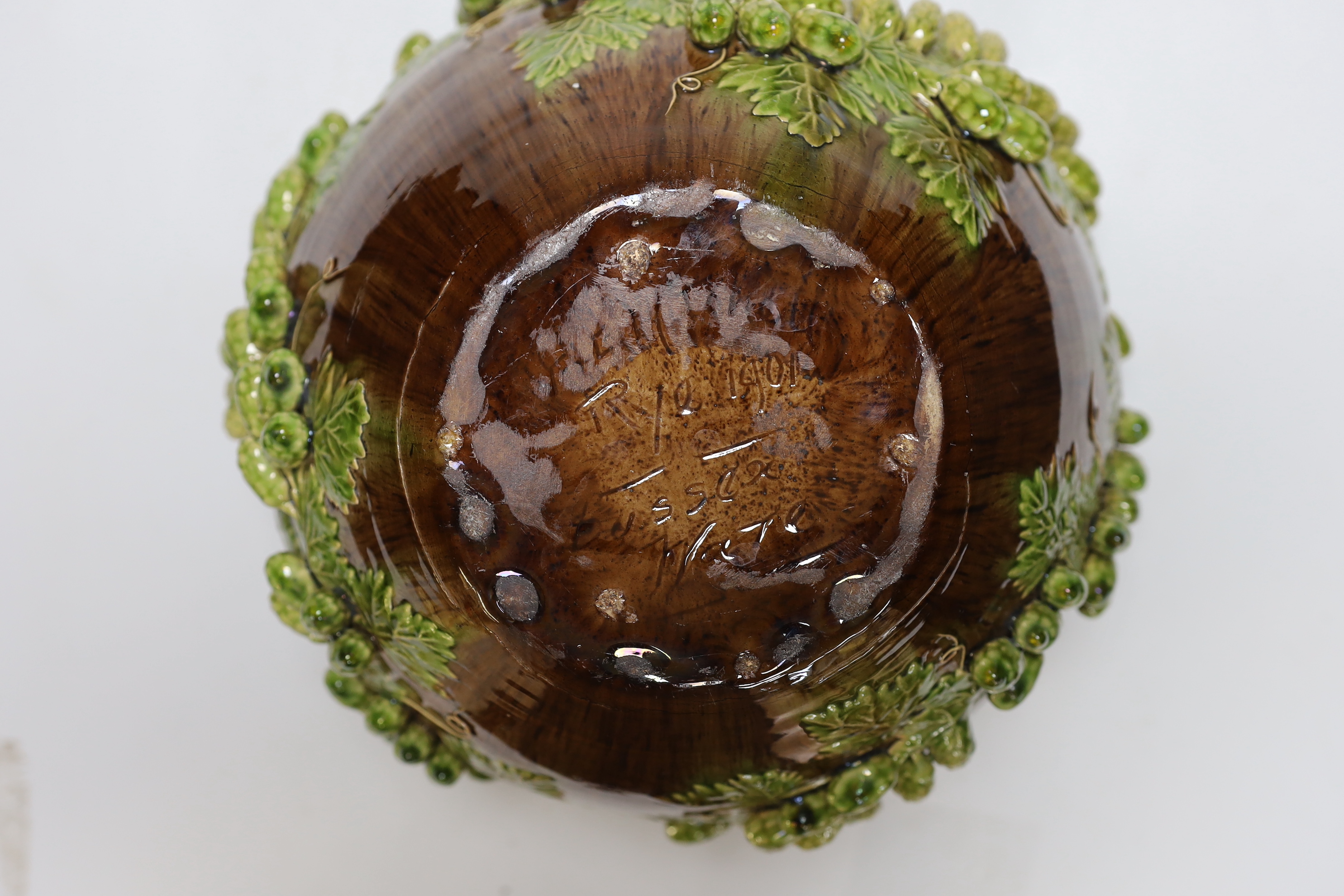 Two early 20th century Sussex Rustic Ware Rye pottery jardinières moulded with hops, each with incised marks and dated 1901 and 1903, height 21.5cm